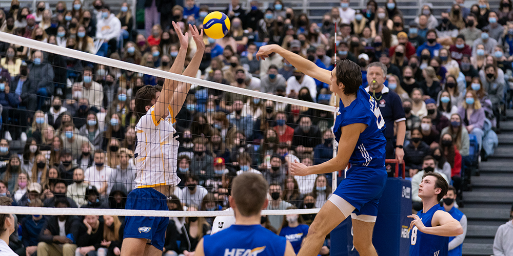 Players at a UBCO Heat men's volleyball game